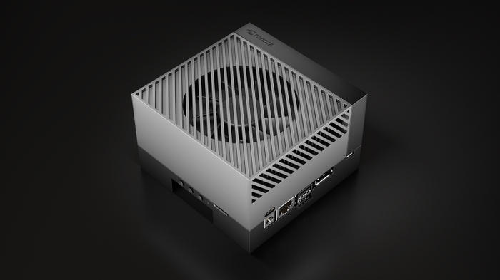 黑色背景上的银灰色 Jetson AGX Orin 开发套件，顶部为大面积散热格栅
